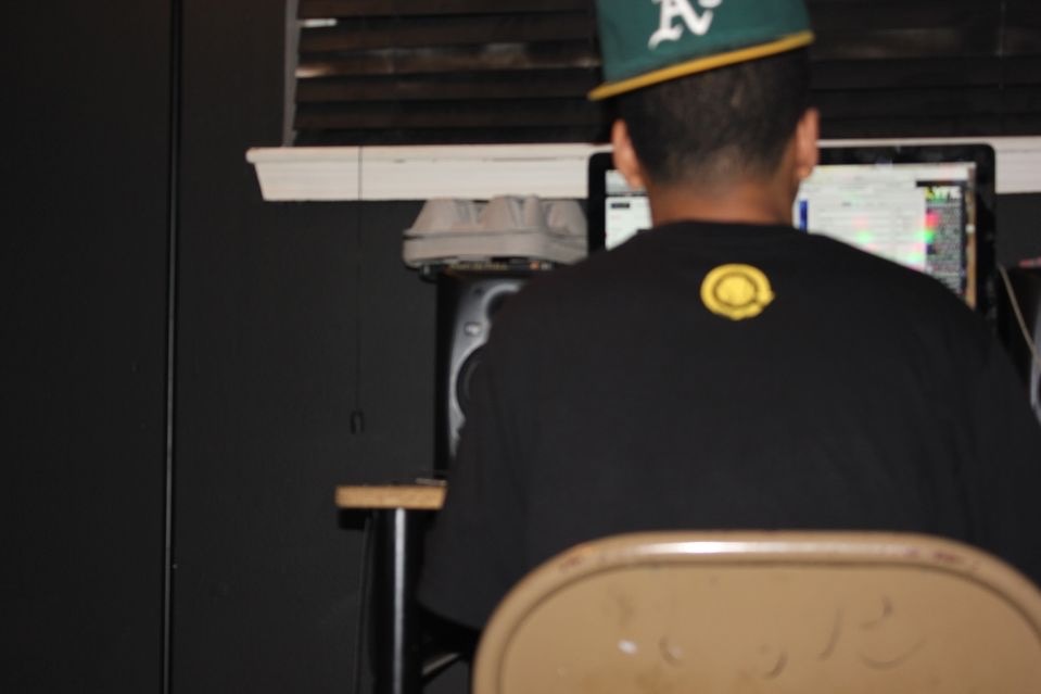 Producer working a session at Dis Li Spot